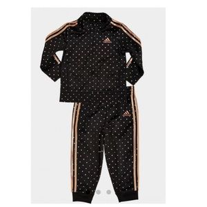 Adidas track suit. Brand new !!